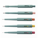 Set of four Kai Retractable T-Sue Biopsy Punches in magenta, 1 mm, medical consumables for tissue sampling.