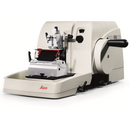 Refurbished Leica RM2235 Microtome equipment for precise tissue sectioning, shown with digital controls and specimen chamber.