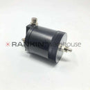 Used Leica ASP300 condensate trap repair part, showing the small, black, plastic component with ports for fluid drainage.