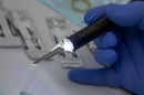 Lumohs Lighted Scalpel Handle No. 3 with blades, used as a surgical consumable for precise cutting and illumination.