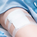 Box of 100 sterile non-adherent pads from Rankin, medical consumables for wound care, displayed in a white box on a clean surface.