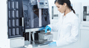 Refurbished Sakura Tissue-Tek glas g2 6500 coverslipper used in histology lab with digital controls and glass slide handling features.