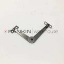 Used Sakura Tissue-Tek A-AK23-095-00 Door Stay repair part for Sakura DRS 2000 tissue processor, showing the metal door stay component.