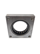 Used Siemens Bearing Block Assembly for Miles Hematek 2000, repair part, showing the metal block and mounting details.