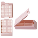 White Swingsette Biopsy Cassettes with detached lid by Simport Scientific, shown in a box of 1,000 consumable biopsy cassettes.