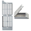 Loose Unisette Tissue Cassettes by Simport Scientific, white plastic consumables for laboratory tissue sample storage.