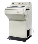 Leica CM1510 S Cryostat used for tissue sectioning, shown on a laboratory bench with control panel and display screen.